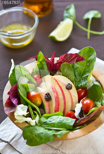 Image of Apple with raisin and spinach salad