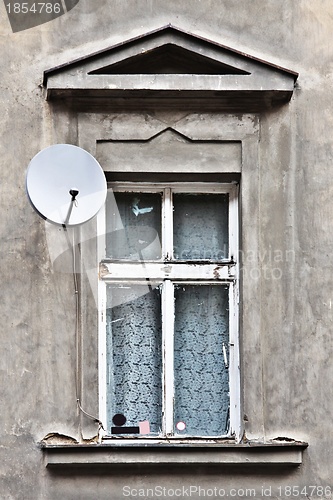 Image of Window and a satellite dish