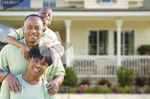 Image of Attractive African American Family in Front of Home