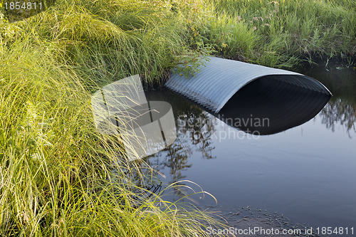 Image of irrigation ditch with culvert