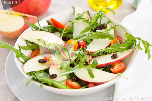 Image of Apple with pomegranate and rocket salad