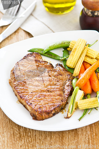 Image of Beef steak with sauté vegetables