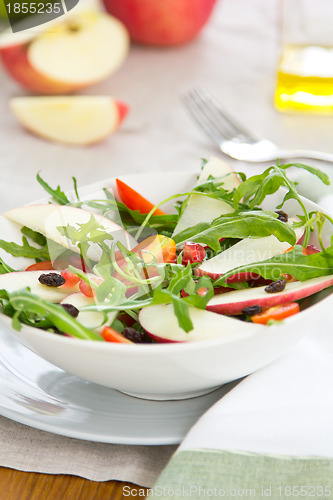 Image of Apple with pomegranate and rocket salad