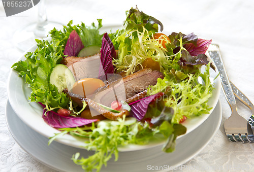 Image of Smoked duck with pomegranate salad
