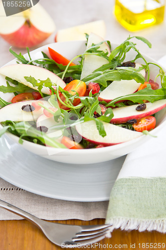 Image of Apple with pomegranate and rocket salad