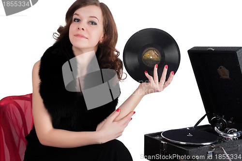 Image of Pretty woman with gramophone