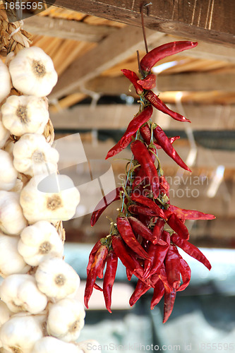 Image of Dried red pepper and garlic, country market