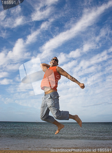 Image of Young active man making a big jump