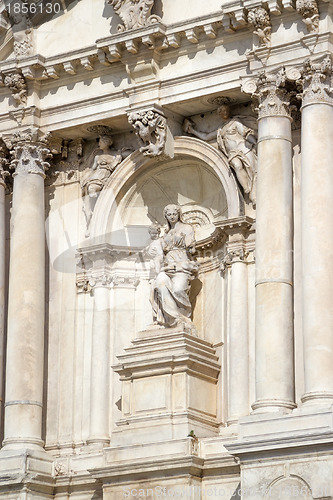 Image of sculpture on a facade of an building