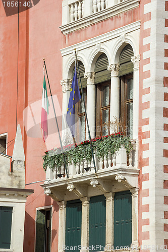 Image of Facade fragment of an ancient building with a balcony