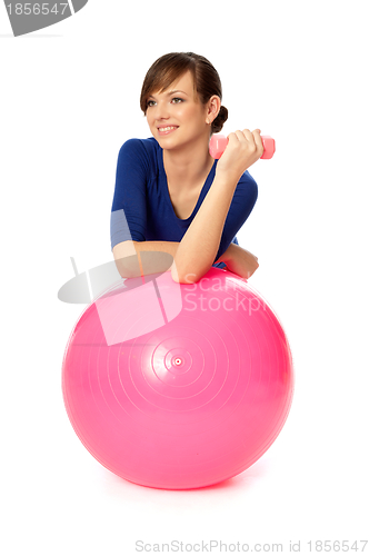 Image of Exercises with dumbbells on a gymnastic ball