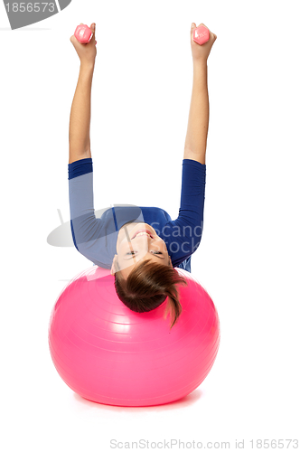 Image of Exercises with dumbbells on a gymnastic ball