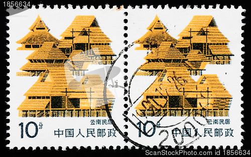 Image of Stamp printed in China shows local dwelling in Yunnan