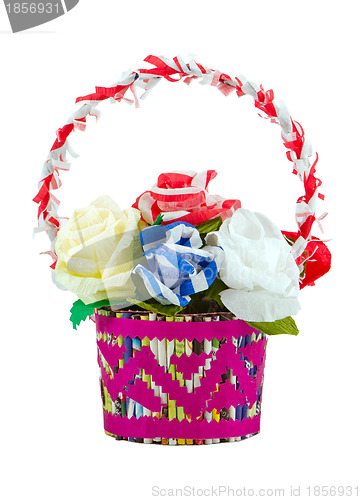 Image of Artificial paper roses in basket isolated on white 