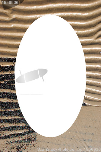 Image of Sea shore fragment and white oval in center 