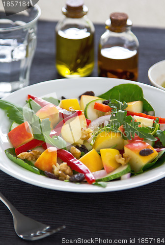 Image of Apple with walnut and rocket salad