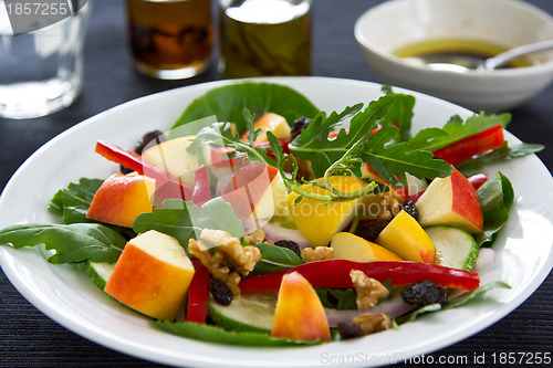 Image of Apple with walnut and rocket salad