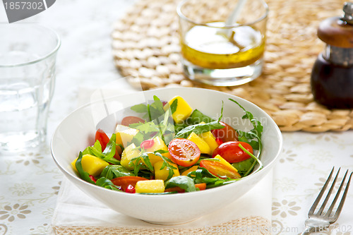 Image of Mango with Pomegranate and rocket salad