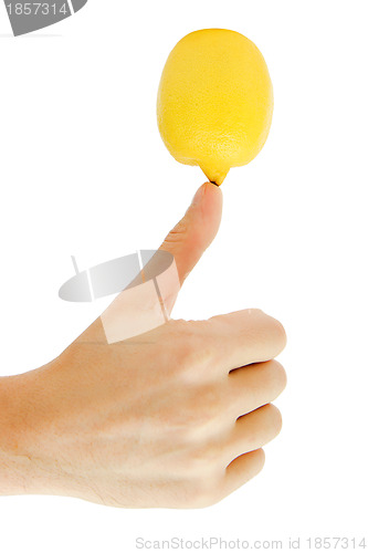 Image of man's hand holding a lemon