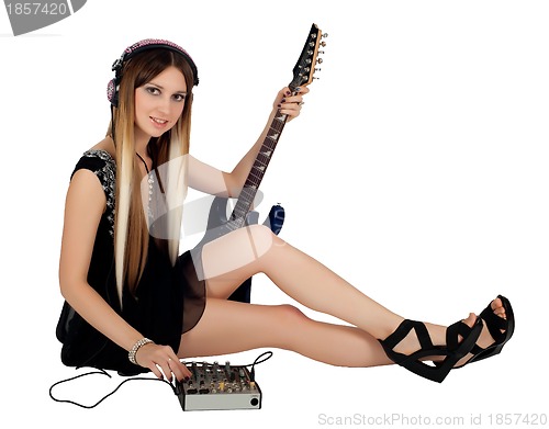 Image of Beautiful woman with guitar