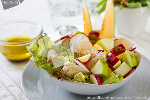 Image of Apple with Grapefruit and melon salad