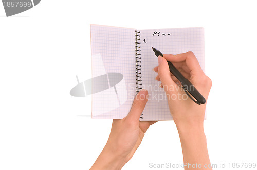 Image of business woman writes business plan