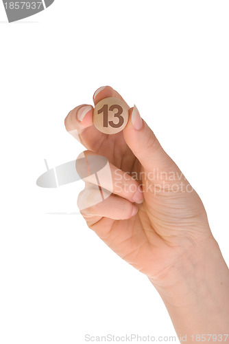 Image of thirteenth bingo ball in the hand