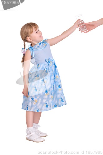 Image of little girl taking a glass of water