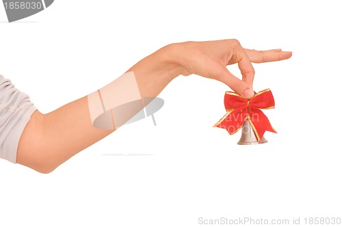 Image of hand bell with red bow