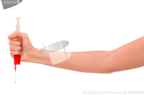 Image of syringe in the woman's hand for making injections