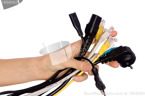 Image of woman taking different cables in the hand