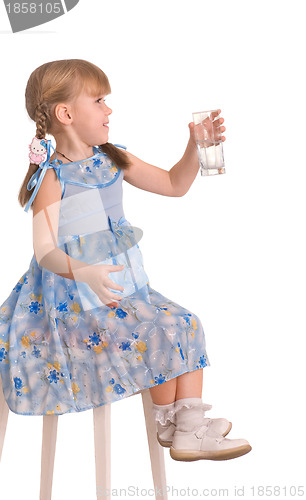 Image of laughing girl drinking a glass of water