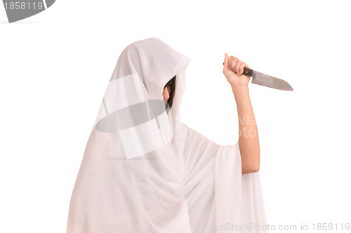 Image of woman in white clothes with knife