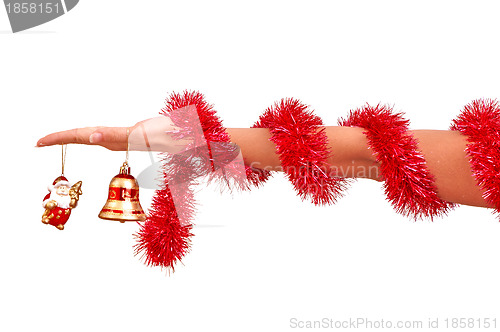 Image of Christmas-tree bell in the hand