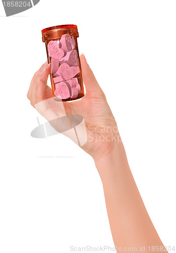 Image of woman holding orange tube with love pills