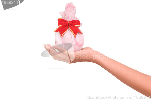 Image of gift in the white bag with red bow