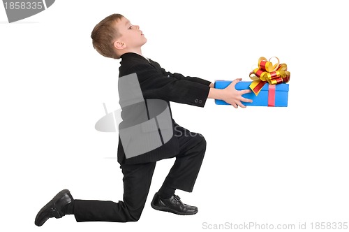 Image of boy presenting a gift for his little love