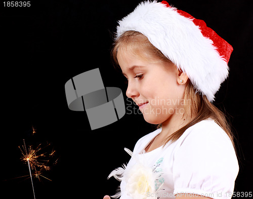 Image of Girl holding sparkler