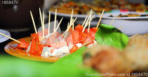 Image of chees with tomatoes