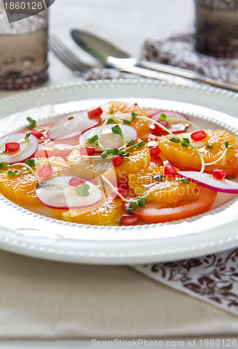 Image of Orange with pomegranate and radish salad