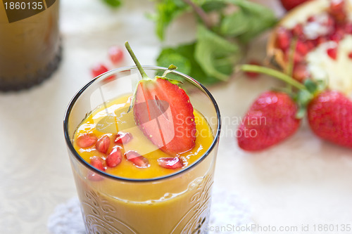 Image of Mango with Pomegranate and Pineapple smoothie