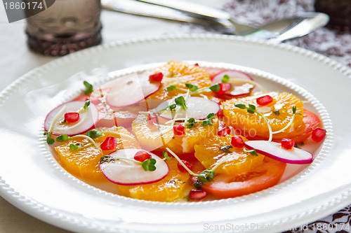 Image of Orange with pomegranate and radish salad