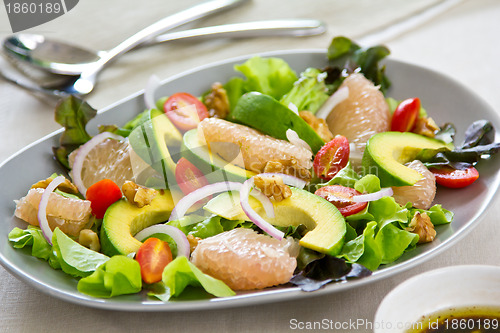 Image of Avocado with Grapefruit and walnut salad