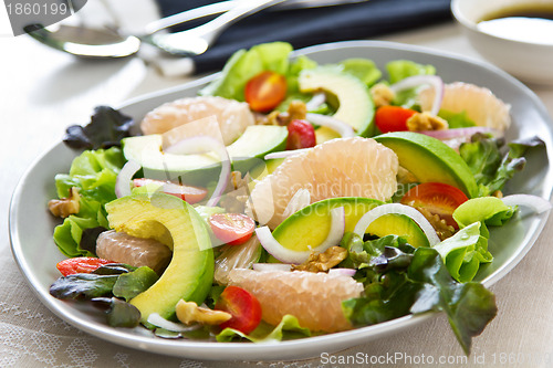 Image of Avocado with Grapefruit and walnut salad