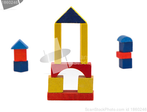 Image of Colorful wooden log toy stand isolated on white 