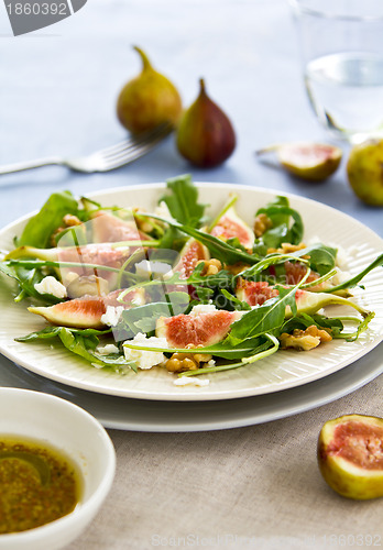 Image of Fig with Goat cheese and rocket salad 