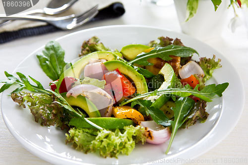 Image of Avocado with grilled vegetables salad