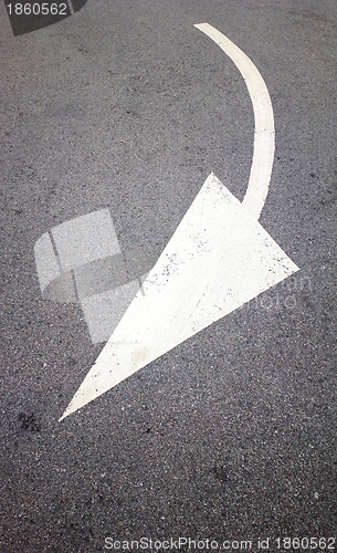 Image of road with arrow direction