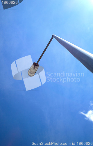 Image of street light with blue sky