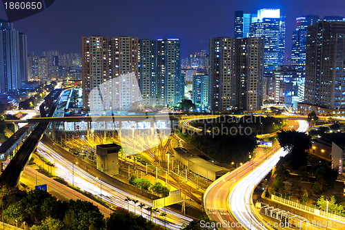 Image of highway and traffic in city at night